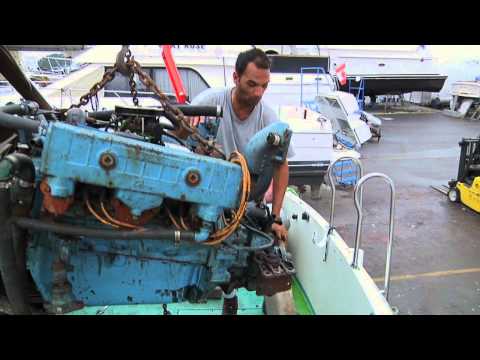 Removing the second 318 Chrysler V8 from a Tollycraft Sportfisher