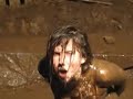 Dirty girls wrestling in the TRICKSTREET mud pit.