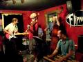 the eric hokkanen trio live at flipnotics 7/25/06 (eric hokkanen, lead; ryan gould,  bass; rick, drums) with friends at flipnotics cafe in austin, tx on 7/25/06.