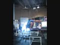 College athlete performs a weighted jump holding 10lb. dumbells and then, upon landing, drops dumbells and jumps onto a 50