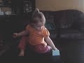Taylor Nicole Sassin sitting on a doll chair