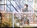 woman using braces and crutches to walk