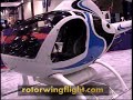 http://www.rotorwingflight.com for more videos and pictures - 
rotorway exec complete walkaround at heli expo 2008 in houston, texas 

wikipedia:

the exec 162f is a two-seat kit helicopter manufactured by rotorway international.
development
the exec 162f is the latest in the exec series of helicopters manufactured by rotorway international. the exec 90 was developed in the early 1990s, it was, at the time, the only piston-powered helicopter to utilize an asymmetrical airfoil for improved autorotation characteristics and safety.

in 1994, a fuel injection system with electronic ignition, and fadec was added to the exec 90, producing the exec 162f.

unlike most u.s.-designed helicopters, the main rotor on the exec 162f rotates clock-wise, as seen from above.

specifications
engine ri 162f, 162 cu. in. (2659 cc)
seats 2
gross weight 1500 lb (680 kg)
empty weight 975 lb (442 kg)
equipped useful load 525 lb (238 kg)
pilot and passenger load 425 lb (193 kg)
fuel capacity 17 us gallons (64 liters)

performance
rate of climb 1000 fpm
hover in ground effect 7,000 ft (2,100 m)
hover out of ground effect 5,000 ft (1,500 m)
service ceiling 10,000 ft (3,000 m)
range, maximum fuel cruise 180 mi (290 km) / 2 hrs
normal cruise 95 mph (83 knots)
max. ias, sea level / standard day 115 mph (100 knots)

basic dimensions
main rotor diameter 25 ft. (7.6 m)
tail rotor diameter 50.25 in. (1.2 m)
length, nose to tail 22 ft (6.7 m)
overall length 29.5 ft (9 m)
cabin width 44 in (1.1 m)
skid width 65 in (1.6 m)
height 96 in (2.4 m)

ri 162f engine
manufacturer rotorway international]
configuration 4 stroke, 4 cylinder piston engine
rated horsepower at 4250 rpm 150
torque at 4250 rpm 185 lb�ft (251 n�m)
maximum torque at 3950 rpm 191 lb�ft (259 n�m)
displacement 162 in� (2659 cc)
cooling liquid cooled
engine dry weight 187 lb (85 kg)