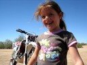 Olivia P. On her first ride with Dad in the Desert