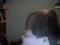 A strange kid with big lips and weird head!