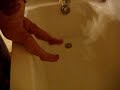 Marjorie going into the bath