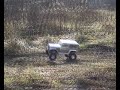 car jumps and racing a Toyota FJ40 Axial Rock Crawler