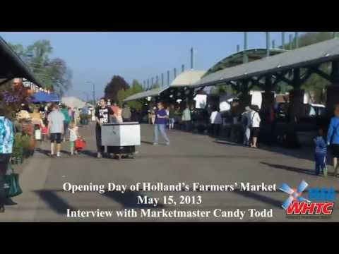 Images from Opening Day of the Holland Farmer's Market on May 15, 2013, with WHTC News Director Gary Stevens chatting with Marketmaster Candy Todd.