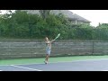 Christine hitting tennis balls