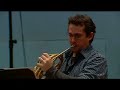extracts of jean-michel damase's rhapsodie for horn and orchestra, featuring ben jacks (horn), orchestra victoria and barry tuckwell (conductor). includes interviews with ben jacks and barry humphries, who comissioned the work.