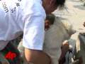 Woman Shelters Animals Injured in China Quake