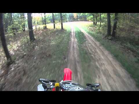 crf250r - 2006 Honda CRF250R & 2007 Yamaha YZ250F trail riding @my cabin in northern Michigan. My camera is on my cousins helmet via the suction cup mount. We took our...