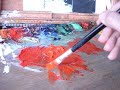 Mixing oil paint, cadmium red