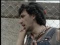 (1982) dexy's midnight runners are a british new wave and northern soul band who achieved their major success in the early-mid 1980s. kevin rowland (vocals, guitar) and kevin 'al' archer (vocals, guitar) founded the band in 1978 in birmingham, england, naming the band after dexedrine, a recreational drug popular amongst northern soul fans at the time. big jim paterson (trombone), geoff 'jb' blythe (saxophone), steve 'babyface' spooner (alto saxophone), pete saunders (keyboard), pete williams (bass) and bobby 'jnr' ward(drums) formed the first line-up of the band to record a single, 'dance stance' (1979). the song only reached number 40 in the british charts, but the next single, 'geno' -- about geno washington -- (featuring new recruits, andy leek (keyboards) and andy 'stoker' growcott (drums)) was a british number one in 1980.
the band members were disappointed with their share of the profits, and soon stole the master tapes of searching for the young soul rebels, their debut lp, in order to renegotiate the deal. the album was released later in 1980 and became a massive success. after the next single, 'there there my dear' was a hit, rowland insisted on choosing the uncommercial, 'keep it, part two' for the following single. it was a failure, and most of the band members quit, angered over continual personality problems with rowland. archer eventually formed the blue ox babes, while blythe, williams, stoker and mick talbot (ex-merton parkas, who had recently joined on keyboards) left to form the bureau. paterson stayed with rowland, who added billy adams (guitar/banjo), seb shelton (drums, formerly of secret affair), micky billingham (keyboard), brian maurice (alto saxophone), paul speare (tenor saxophone) and steve wynne (bass), releasing 'plan b', 'show me' and 'liars a to e' in 1981 without much success. rowland then recruited fiddle players, helen o'hara (from archer's new group, the blue ox babes), steve brennan and roger macduff, known collectively as 'the emerald express'. with the addition of new bass player, giorgio kilkenny this line-up recorded too-rye-ay in 1982, a celtic folk and soul hybrid. the first single, 'the celtic soul brothers', was mildly successful but 'come on eileen' soon followed, and became a number one hit in both the uk and the united states. feeling that their role in the group had diminished following the arrival of the fiddles, the brass section of paterson, speare and maurice left to form the tko horns, while kilkenny was replaced by johnny edwards on bass and billingham left to join general public. with the singles, 'jackie wilson said (i'm in heaven when you smile)' (a van morrison cover) and 'let's get this straight (from the start)' maintaining their popularity, the group continued to tour until 1983 with a nucleus of rowland, adams, o'hara and shelton augmented by other musicians.
after a two year break, dexy's returned in 1985 with the critically-acclaimed album, don't stand me down, featuring rowland, adams, o'hara and nicky gatfield together with various seasoned performers including vincent crane (ex-atomic rooster), julian littman and tim dancy (who had been al green's drummer). rowland at first refused to issue any singles from the album, and by the time 'this is what she's like' was released, it was too late to save the album from commercial failure. the group disbanded the following year after a brief return to the charts with the single, 'because of you' (which was used as the theme tune to a british sitcom, 'brush strokes'), and rowland became a solo artist with the release of 1988's poorly-received album, the wanderer. despite spending much of the 1990s suffering from financial problems and drug addiction, rowland made plans to reform dexy's together with big jim paterson, although these resulted in no more than a solitary tv performance in 1993. returning once more as a solo performer, rowland signed to creation records, releasing an album of cover versions called my beauty in 1999, which sold poorly. the demise of creation meant that the planned follow-up album which would, once again have featured dexy's midnight runners was never made. however, in april 2003 the group announced that they would be reforming for a tour and a new greatest hits album.