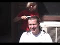Shaving his head. Beautiful.