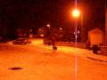 Snow scootering with Alaskan Malamute Oakley