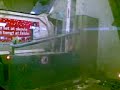 (Low qual) Rear loader unloding at incinerator