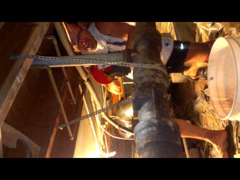 how to unclog old cast iron pipes