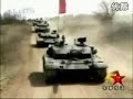 99A2坦克，是中国目前正在根据其原有的基础型99型坦克，研制一种更加具有强大威力的99A2型坦克。99A2其主要车体设计采用了原有的99式坦克的形式。在打击、导航、夜间观测系统上，得到了很好的加强。不但保持了原有的主∕被动进程防御系统。同时还增加了一些解放军自行研制的新型系统。 该车身装甲结构采用了原有99型坦克基础装甲结构。全新的披挂型爆炸反应装甲，很大程度上增加了坦克的装甲防护能力。在面对目前亚洲出现的类似韩日最新主战坦克增强型穿甲弹打击下，具有了一定的防护提高能力。 中国这款99A2主战坦克，会有2种不同火炮配置，目前一种99G型或者称A1坦克安装了140mm中国产主炮。同时解放军为它配备了新型穿甲弹，贫铀穿甲弹。虽然中国一贯不对外宣称贫铀穿甲弹使用与研发细节。但是依旧有消息表明，中国解放军具有这种与美国陆军装甲弹部队几乎同等水平的穿甲弹。这种穿甲弹按照中国部门的试验，可以在1400米洞穿包括MIA2的全部第三代主战坦克的主装甲。 与之前的99A1相比，99A2炮塔前部的体积有所增大，而且原先的反应式装甲也经过了重新设计。从结构上判断，99A2的整体防护能力得到了进一步增强：其披挂式爆炸反应装甲，可明显提升对亚洲各国新型穿甲弹的抵御能力。另外，99A2的底盘也得到强化，提高了抗反坦克雷的性能。 需要特别强调的是，与中国以前装备的各型坦克不同，99A2的炮塔上装备了一种配备有毫米波雷达的全新主动防护系统。而此前99式坦克上装备的则是一种激光压制系统，外界对其作用的频率范围仍不十分清楚。 99A2的装备了一体化的动力装置，包括横向设置的发动机(功率为1500马力)、传动系统、冷却系统和燃料箱。 与此同时，99A2的火控系统也得到了进一步的完善。该系统包括瞄准手和车长使用的瞄准仪(配备单独的稳定装置)、激光测距仪、热成像仪、数字化弹道计算机、武器稳定仪 <b>...</b>
