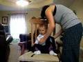 Putting baby on back in Beco Butterfly