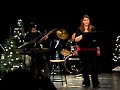 we're about the same musicians, except for the guiatrist and the pianist. unfortunately the pianist here learned the song 10 minutes before the show because the real one was stocked with is car in the snow storm that was evovling outside. big thanks to him