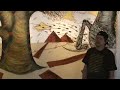 Andrew Schoultz talks about his mural. Andrew Schoultz talks about his mural.