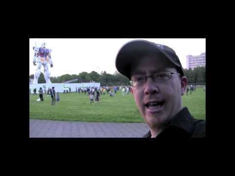 Giant Gundam Gathers Gawking Geeks