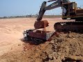 A excavator Escavadeira A excavator Escavadeira