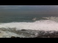 Big Waves at Dee Why Point flooding the pool like a tsunami - Sydney Australia - 2 May 2011
