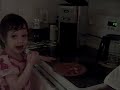 Zoe 2 and a half watching digital clock