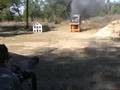 Airsoft Minigun Ripping a TV apart