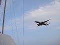 Plane Flying over Sail Boat