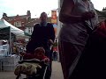 One long camera shot of morpeth town market square, on market day. from 5.30am-12pm, this has been sped up to 4 minutes. The music is by Robb Dougan, it is called 