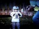 Tyler kicking football