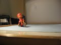 Wind-Up Celluloid Boy on Tricycle (eBay item #400003599605)