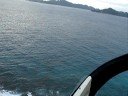 Manu landing with helicopter in la Digue Island-Seychelles