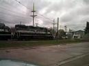 Evansville Western mixed freight crossing clairmont avenue before entering the north end of Howell Yard.