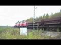 videos de Freight train 4975 passes Karsikko level crossing
