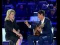 Catherine Deneuve sings with Gianni Morandi in Italian show