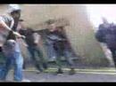 Chris Skate boarding into a fence :]