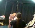 Bibs the cleaner mops the floor after a GLC gig