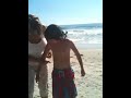 Gavin surfing with Sam at Swamis (Cardiff)