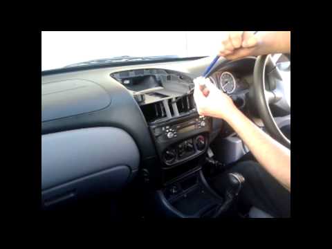 how to remove cd player from nissan primera