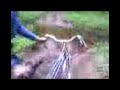crossing a river on a bicycle