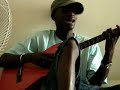 papis sings a bit of acoustic wolof in uni halls in dakar, senegal