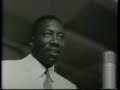 this clip was taken from count basie & his orchestra who featured at the newport jazz festival in 1962.
joe williams sings along with `big` jimmy rushing.(many thanks for identifying him).
sadly, all are no longer with us, but hopefully they still give sell-out performances on the other side.
the world is a sadder place without them.