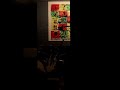 John Power singing & playing guitar backstage in Oldham