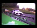Audi R8 chases a Porsche 911 GT3 RS around Cadwell Park
