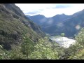 The Geiranger Fjord (Norwegian: Geirangerfjorden) is a fjord in the Sunnmøre region of Møre og Romsdal county in Norway. It is in the municipality of Stranda. It is a 15-kilometre (9.3 mi) long branch of the Storfjord (Great Fjord). The small village of Geiranger is located at the end of the fjord where the Geirangelva river empties into it. The fjord is one of Norway's most visited tourist sites and has been listed as a UNESCO World Heritage Site, jointly with Nærøyfjord, since 2005, although this status is now threatened by the disputed plans to build power lines across the fjord.[1] A car ferry, which doubles as a sightseeing trip, is operated by Fjord1 Nordvestlandske. It runs lengthwise along the fjord between the small towns of Geiranger and Hellesylt.