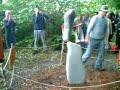 an excellent demonstration by adrian grey, stone balancer, at the sculpture garden event in lyme regis.